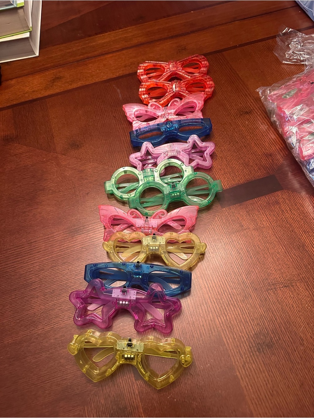 Kids Light-Up Novelty Sunglasses Pack - Assorted Colors. They are four packs